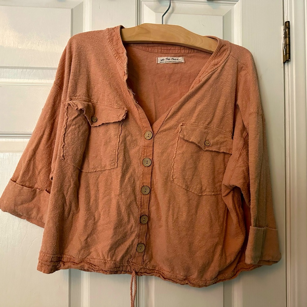 Free to be you! We the Free slouchy top in an earthy peachy tone.